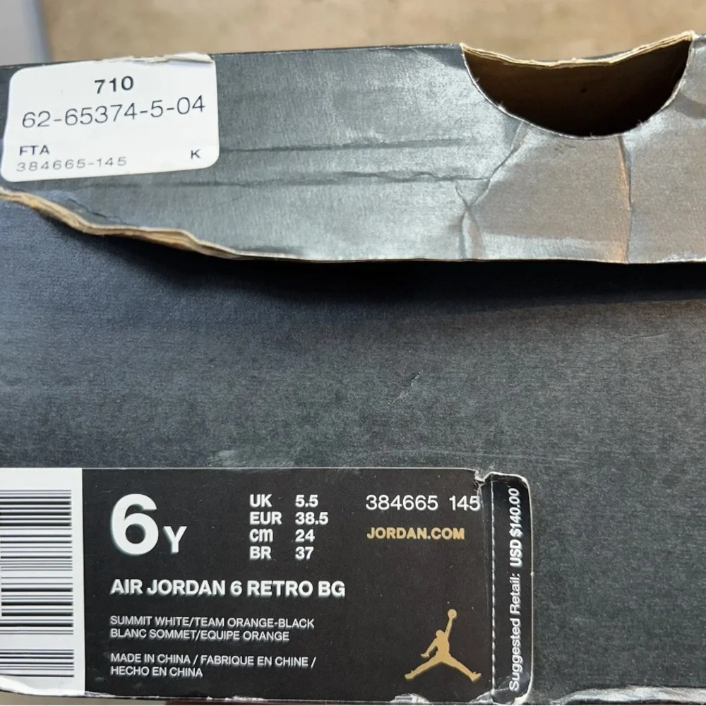 Nike Jordan 6 White and‎ Orange High-Top Sneakers